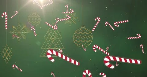 Image of candy cane and snow falling over green background 库存插图