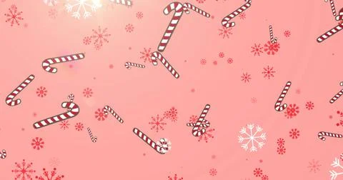 Image of candy canes and snow falling on glowing pink background Stock Illustration