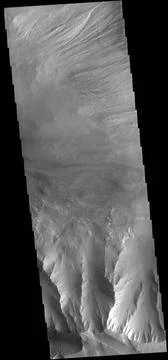 This image captured by NASA s 2001 Mars Odyssey spacecraft shows eroded ma... Stock Photos