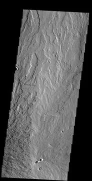 This image captured by NASA's 2001 Mars Odyssey spacecraft shows lava flows.. Stock Photos