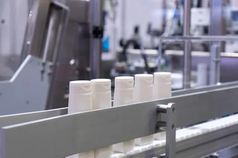 This image captures a close-up view of a high-tech automated manufacturing li Stock Photos