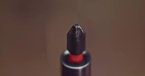 This image captures a detailed closeup shot of a screwdriver tip featuring a Video stock 297952676