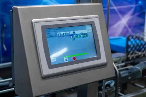 This image captures a detailed view of an advanced industrial control panel,  Foto stock