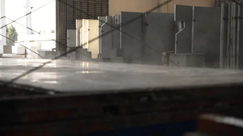 This image captures steam billowing from a concrete production line Stock Footage 314801903