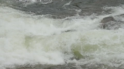 Image capturing the dynamic movement of white water rapids in Estonia Stock Footage 270212792