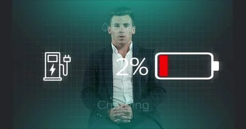 Image of car charging interface against caucasian businessman talking looki.. Stock Photos