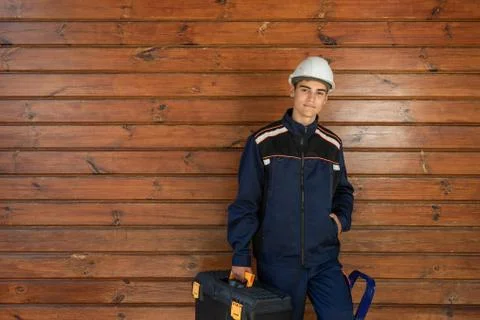Image of a carpenter or cabinetmaker with a set of tools on the background of Stock Photos
