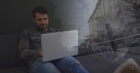 Image of caucasian businessman using computer over data processing and cityscape Stock Photos