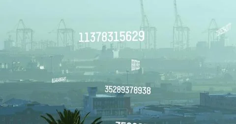 Image of changing numbers and computer language over fog covered modern city 스톡 사진
