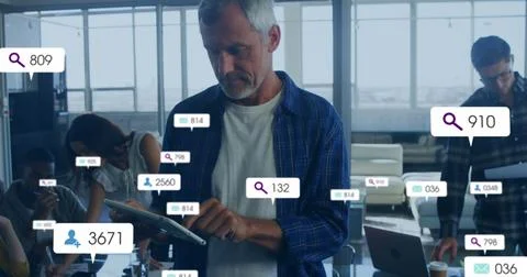 Image of changing numbers, icon in notification bars, caucasian man using Stock Photos