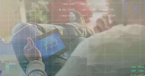 Image of charts processing data over caucasian man using tablet Stock Photos