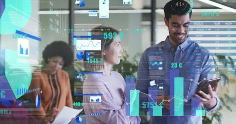 Image of charts processing data over happy diverse colleagues with tablet at 写真素材
