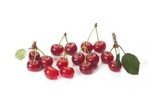 Image cherries on a white background. Cherries with drops isolated on white b Foto stock