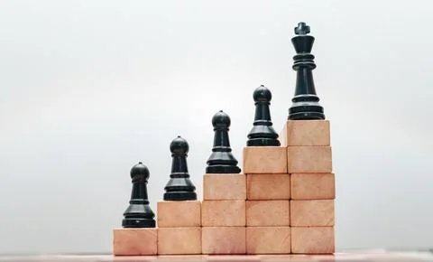 Image of chess pieces on a chessboard Stock Photos