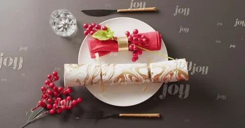 Image of christmas greetings text over christmas cracker and place setting with Stock Illustration