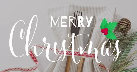 Image of christmas greetings text over place setting and christmas decorations Ilustração Stock