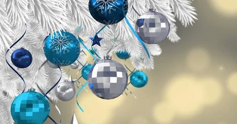 Image of christmas tree decorations over snow falling on christmas tree 스톡 사진