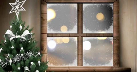Image of christmas tree window over snow falling and cars Ilustração Stock