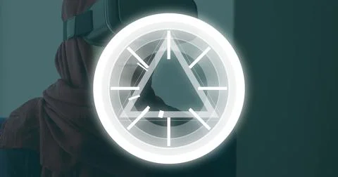 Image of circles and triangles pulsating over woman wearing vr headset Stock Photos