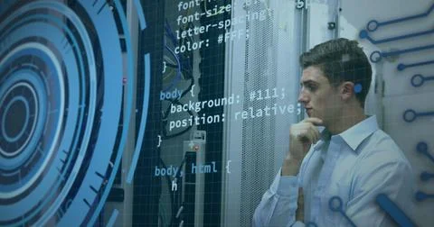 Image of circles, computer language, thoughtful caucasian engineer looking at Stock Photos