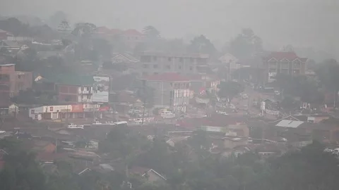 Image of a city trapped in fog Stock Footage 148747582