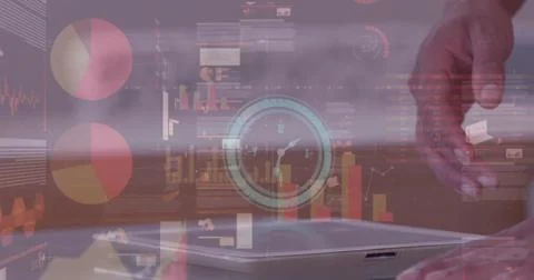 Image of clock and financial data processing over businessman using tablet Stockfoto's