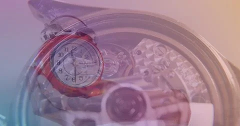 Image of clock over hand holding clock Foto stock