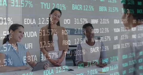 Image of cloud text in cloud, trading board, diverse coworkers discussing a.. Stock Photos