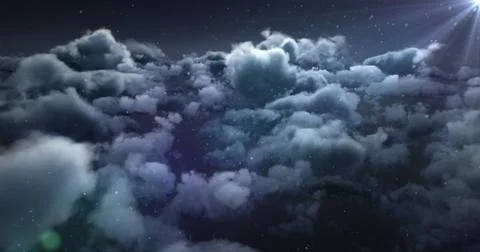 Image of clouds and dots moving over dark sky 写真素材