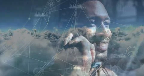 Image of clouds and a network of connections with smiling man talking on Stock Photos