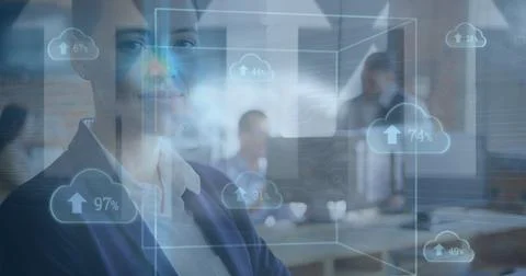 Image of clouds, data processing over diverse business people in office Stock Photos