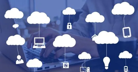 Image of clouds with icons over hands using laptop Foto stock