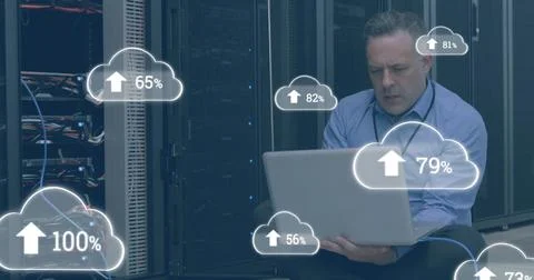 Image of clouds with numbers over stressed caucasian man working on laptop in Stock Illustration
