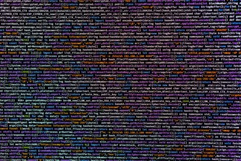 Image of a code editor displaying blurry lines of computer programming code.. Stock Photos
