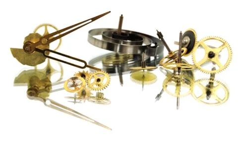 The image  of the cogs, wheels and gears of the inside of an old clock. Stock Photos