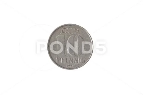 Image of a coin in ten pfennigs of the German Democratic Republic. Oak leave. Stock Photos