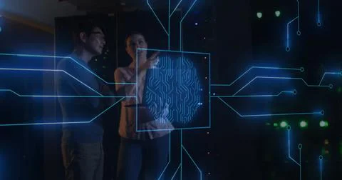Image of computer circuit board and digital brain over diverse workers in server 写真素材