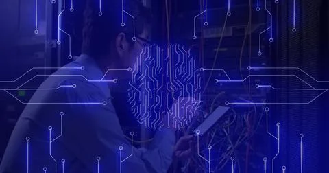 Image of computer circuit board and digital brain over asian man in server room Foto stock