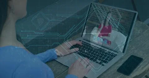 Image of computer circuit board elements over woman using laptop on image call Stock Photos