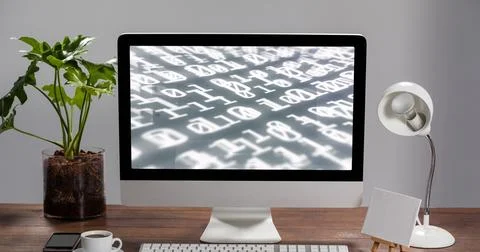 Image of computer with data processing on screen on desk in office 스톡 사진