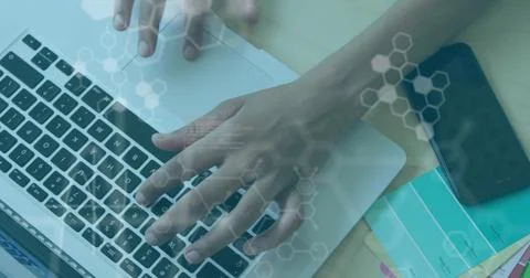 Image of computer language and hexagons, overhead view of cropped hands using 스톡 사진