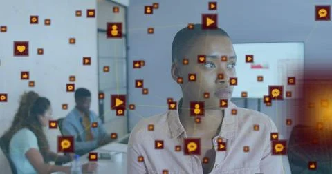 Image of connected icons over smiling short hair biracial woman standing in Stock Photos