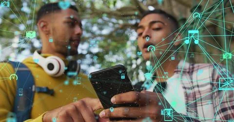 Image of connections and data processing over biracial man using smartphone Foto stock