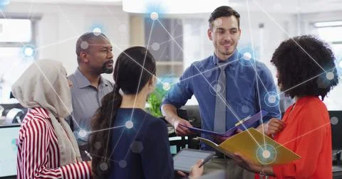 Image of connections and data processing over diverse business people in office Stock Photos