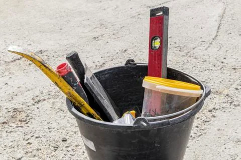 Image of construction tools in a bucket Foto stock
