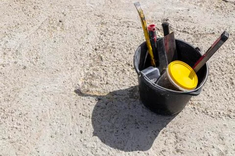 Image of construction tools in a bucket Stock Photos