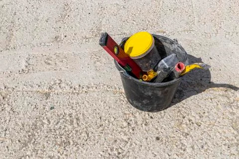Image of construction tools in a bucket Stock Photos