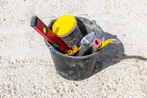 Image of construction tools in a bucket Foto stock
