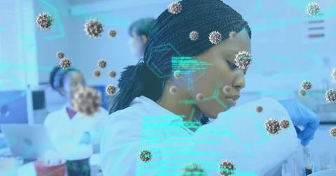 Image of coronavirus cells and data flowing over a female laboratory workers Foto stock