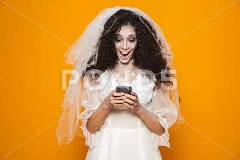 Image of creepy woman on halloween wearing wedding dress and scary makeup usi Stock Photos